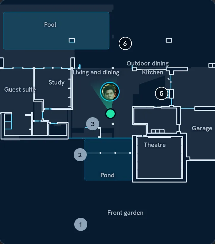 The house plan, with Drey and Sarah in the living and dining room